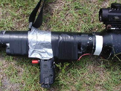 picture of the grip, scope and strap, along with the unsightly duct tape