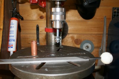 Assemble (3) 3/8&amp;quot; flat washers on your mandrel between nuts. Use the drill press and file until the washers just fit into the tube.