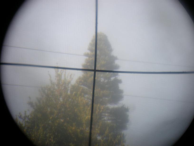 Now put everything back together, the binocular should now have dark, in focus cross hairs. (probably should have wrapped it a little tighter to get straighter lines)