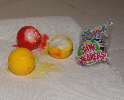 Jawbreakers shot into the bucket of water.