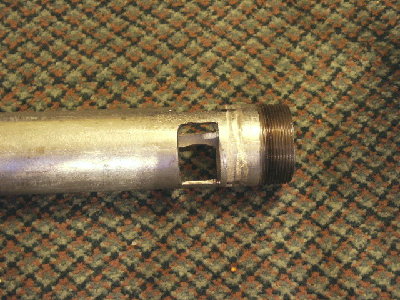 Valve ports for QDV valve.  The 3 metal bars keep the ends in alignment, the piston straight, and keep the o rings from coming out of the piston groove.