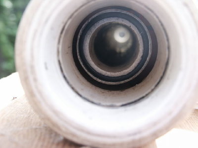 Mouse Musket valve seat.  Barrel is suspended by 3 pieces of poly tubing zip tied to the barrel about 6 inches from the breech.