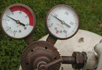 Close up of the regulator set to 12 PSI.  This pressure and below worked well with the golf ball part way down the barrel and is about the lowest pressure that ejected the ball at all when it was pushed all the way in.