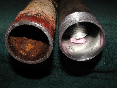 Nice and shiny.  Only minor rust pits remain and spots of the weld.  For comparison, the pipe on the left is what this was cut from.