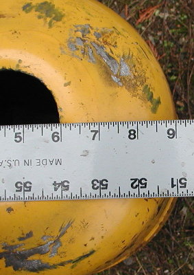 Tank diameter is 9 inches.  The weld around the middle is slightly larger.