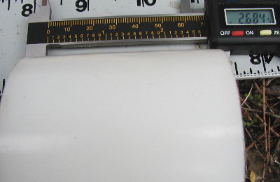 Piston is 2.684 inches long.  I get to turn it down this weekend on a lathe.  No need to measure the current diameter.  It's too big.