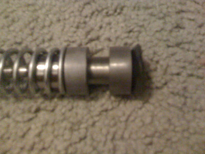 Piston head. Where the trouble is, The step (side with the spring) The inside is the part the makes contact with the trigger part.