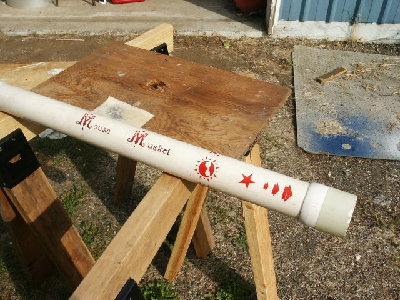 A decent shot of the Musket artwork finishes this series of photos.  This cannon lasted 5 years.  It broke almost a piston per year. The sandpaper glued to the board is the piston size adjustment tool. ;-)