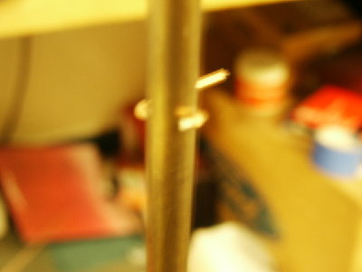 Pin behind the piston