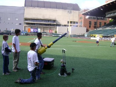 The Arlington team launches some shirts into the upper deck at PGE park in Portland Oregon with Nitrogen.  They put one shirt on the roof.