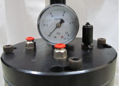 The pressure gauge and the safety valve