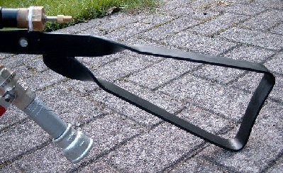 Closup of the stock. This is made of 4 mm thick steel, heated, twisted, hammered and welded.