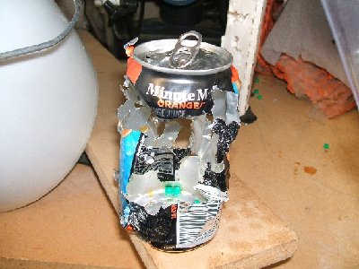 A can with one full magazine dumped into it. The strafer totally ripped the shit out of it.