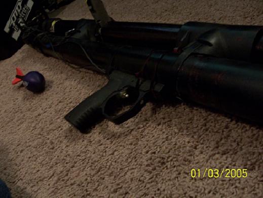 This is a modified trigger off of an old paintball gun. We used a momentary push button switch to activate the valve.