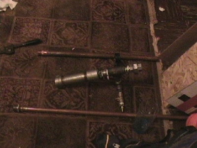 the gun with the two barrels beside it