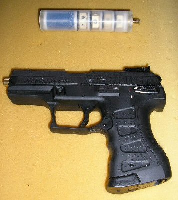 Anics A3000 suppressor construction - syringe tube body with foam/rubber baffles and drilled out lego blocks as separators, attached to the pistol with a custom made threaded adapter