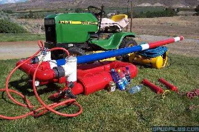 Some of my favorite projectiles in the foreground.<br /><br />The two red slugs are the line throwing projectiles. PVC pipe is filled with clean gravel. The barrel is 10' long. 7.5' of 6&amp;quot; chamber.